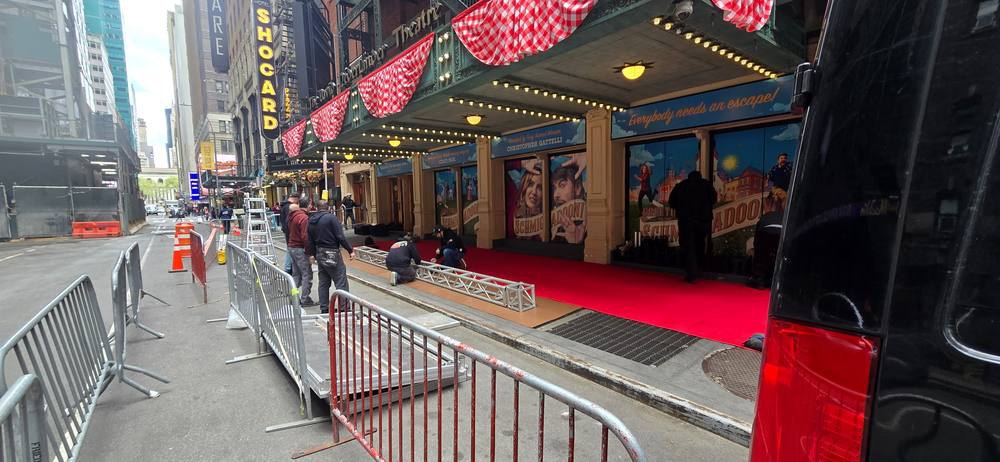 Red carpet, truss and lighting installed outside the theater for a Broadway opening night
